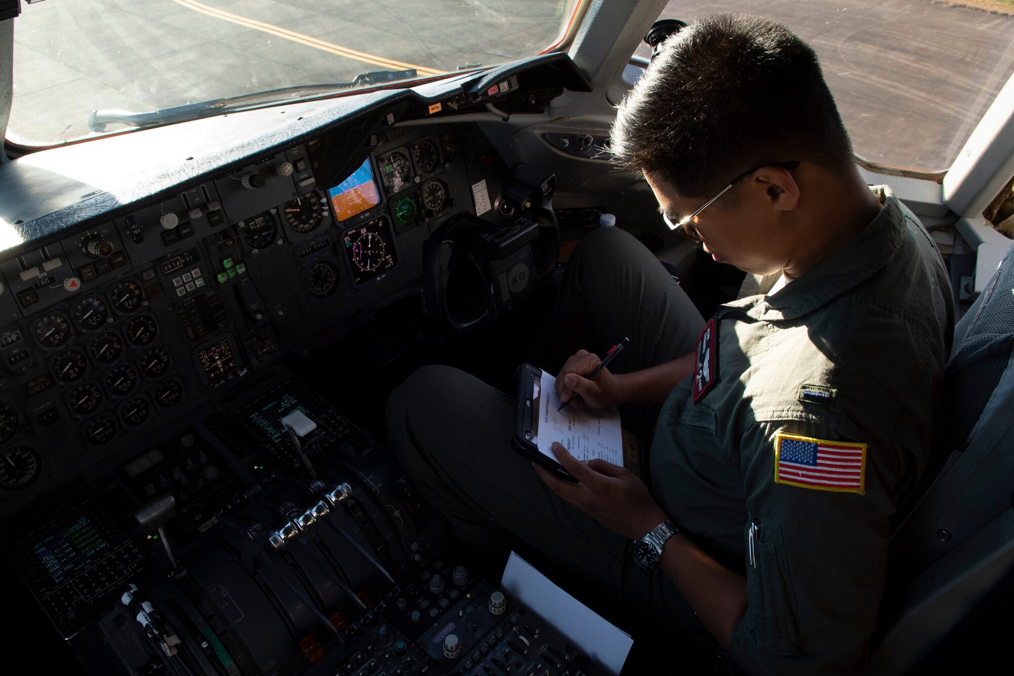 A U.S. Air Force KC-10 Extender pilot performs preflight checks aboard an Extender July 16, before departing from Brisbane International Airport, Australia, in support of Exercise Talisman Sabre 19. The Extender arrived July 12 to support major air operations for USAF, Royal Australian Air Force and U.S. Navy aircraft operating out of RAAF Base Amberley for TS19. (U.S. Air Force photo by Senior Airman Elora J. Martinez)