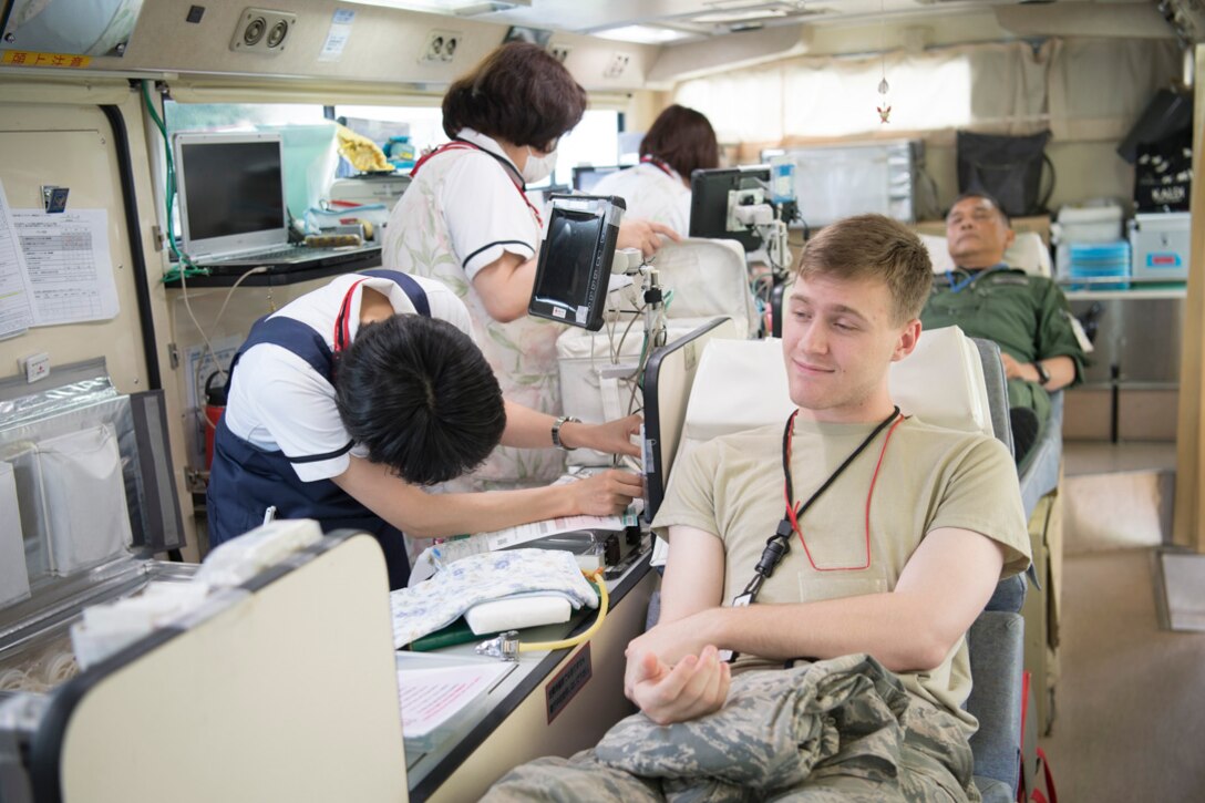 Airman 1st Class, Chance Chase 374th Communication Squadron network operator, relaxes after donating blood at Yokota Air Base, Japan, July 18, 2019.