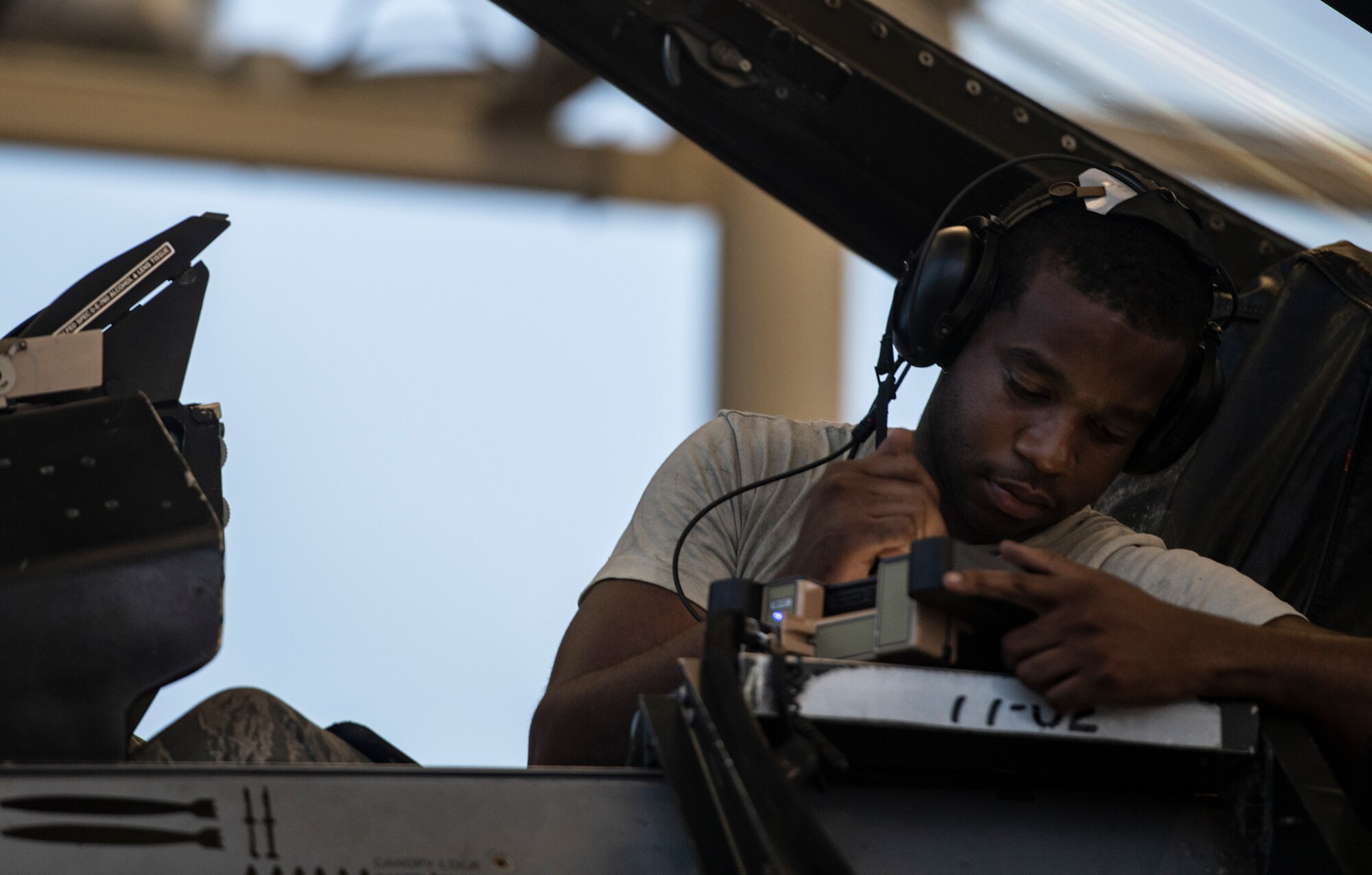 U.S. Air Force Staff Sgt. Martin Boykin, 20th Aircraft Maintenance Squadron crew chief, inspects the cockpit system of an F-16 Viper at Shaw Air Force Base, South Carolina, July 12, 2019.