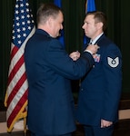 Lt. Gen. Bradd Webb, incoming commander for Air Education and Training Command, presents the Silver Star to Tech. Sgt. Michael Perolio from the Special Warfare Training Wing during a ceremony at Joint Base San Antonio-Lackland’s Gateway Club July 18. Perolio was presented the Silver Star in connection to military operations against an armed enemy in Afghanistan Jan. 11, 2018, during Operation Freedom’s Sentinel.