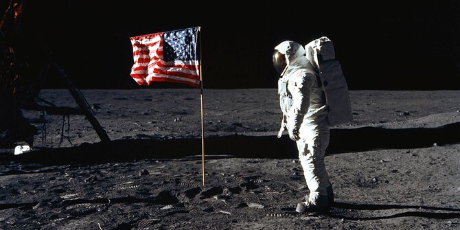 Buzz Aldrin, lunar module pilot, walks near the lunar module during the Apollo 11 extravehicular activity.