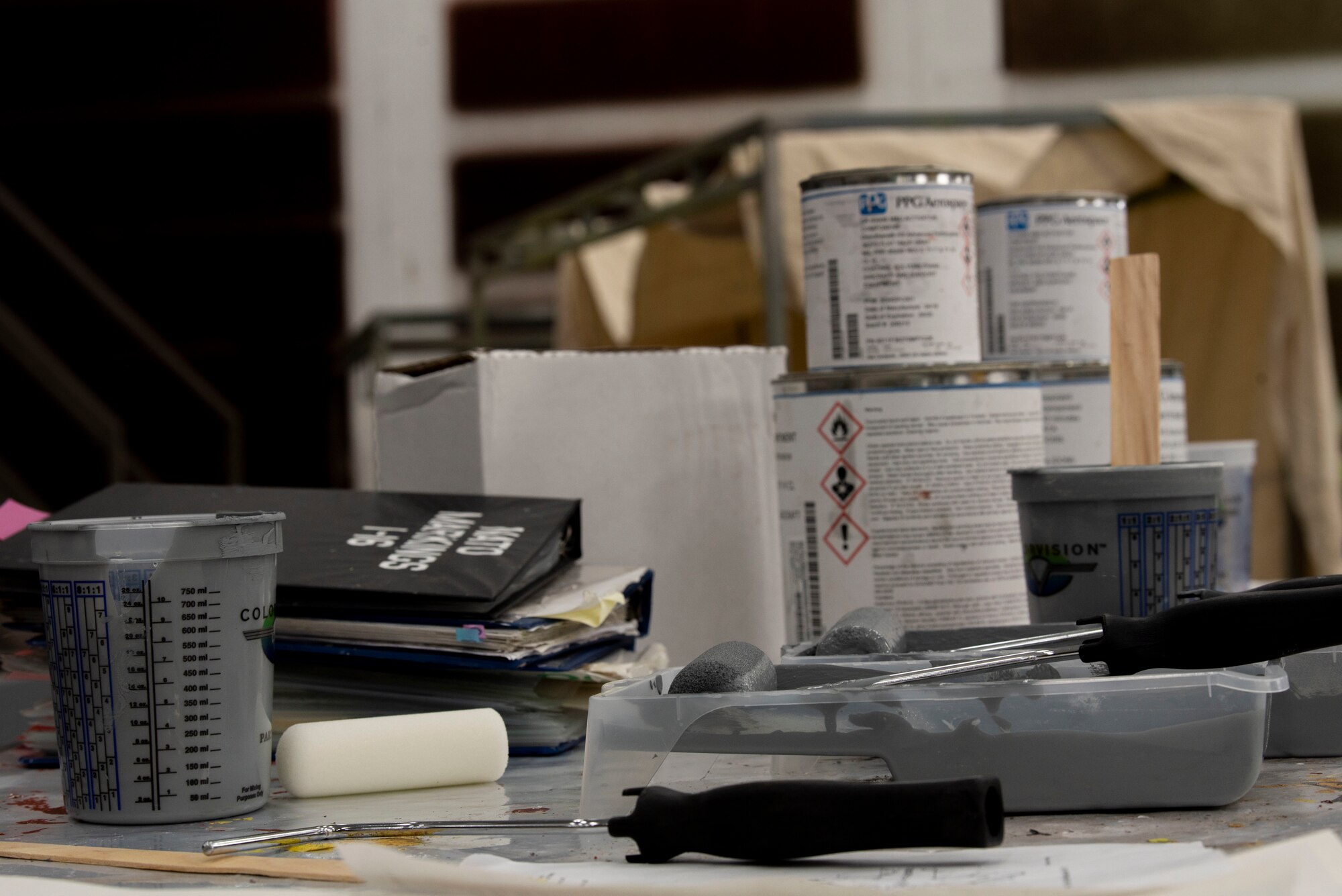 Decal paint is placed on a table in the 20th Equipment Maintenance Squadron (EMS) paint booth at Shaw Air Force, South Carolina, June 20, 2019.