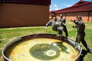 Student pilot is thrown into a solo tank after pilot’s first solo flight.