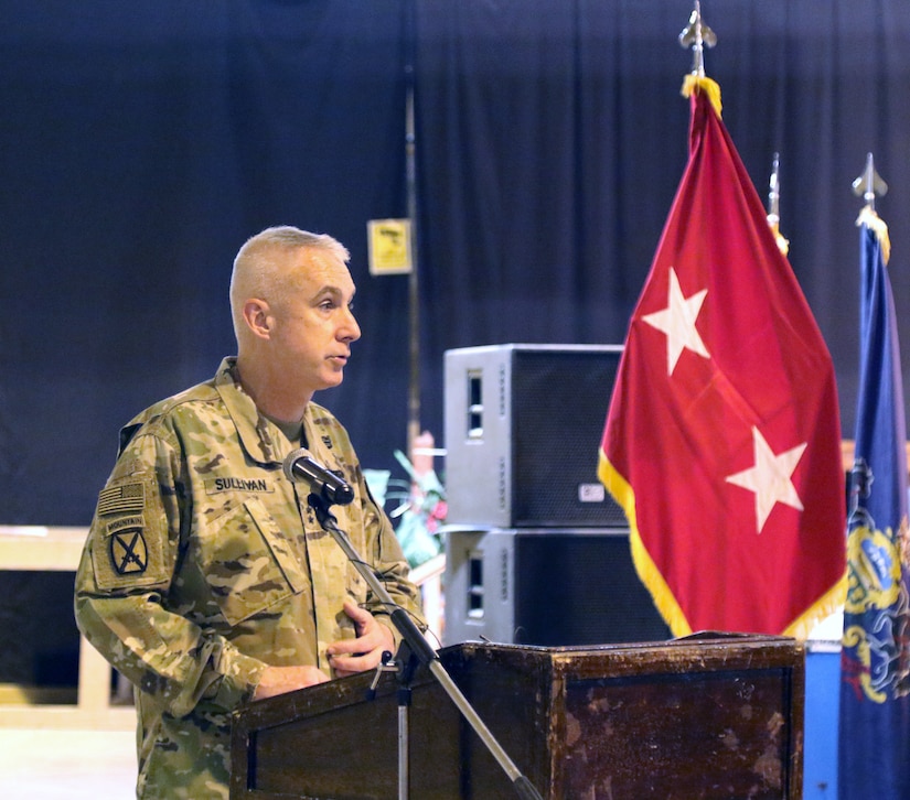 Maj. Gen. John P. Sullivan, commanding general of 1st Theater Sustainment Command, speaks during a transfer of authority ceremony between the 8th Medical Brigade and 3d Medical Command Deployment Support - Forward at Camp As Sayliyah, Qatar, July 18, 2019.