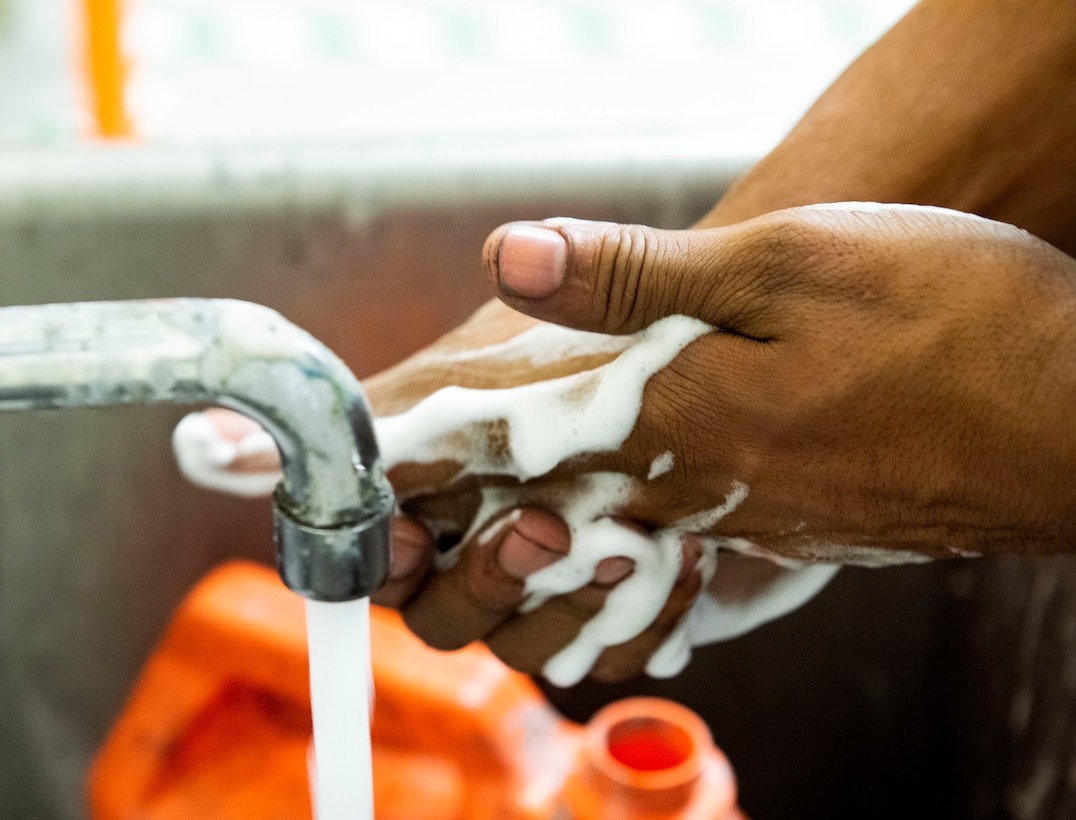 Senior Airman James Jennings, 23d Maintenance Squadron armament (ARMs) flight gun element member, cleans his hands after performing an inspection, July 17, 2019, at Moody Air Force Base, Ga. The ARMs shop primarily performs quality armament systems maintenance and inspections to provide aircrews with safe and reliable weapon systems for lethal airpower employment. (U.S. Air Force photo by Senior Airman Erick Requadt)