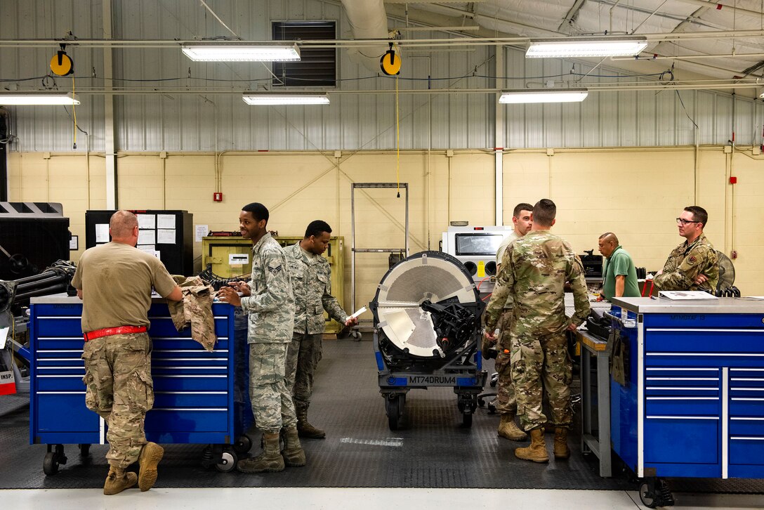 Airmen from the 23d Maintenance Squadron armament (ARMs) flight develop future action plans, July 17, 2019, at Moody Air Force Base, Ga. The ARMs shop primarily performs quality armament systems maintenance and inspections to provide aircrews with safe and reliable weapon systems for lethal airpower employment. (U.S. Air Force photo by Senior Airman Erick Requadt)