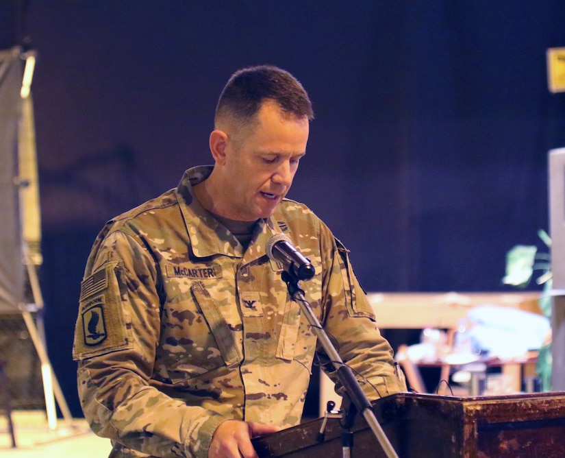 Col. Jeffrey McCarter, 8th Medical Brigade commander, speaks during a transfer of authority ceremony between 8th Medical Brigade and 3rd Medical Command Deployment Support - Forward at Camp As Sayliyah, Qatar.