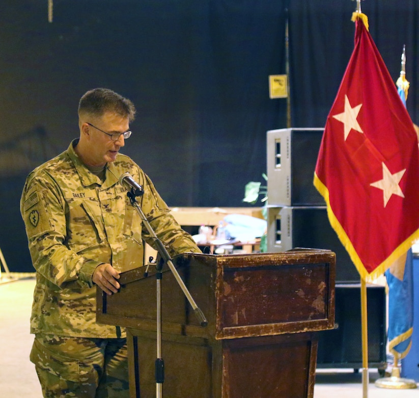 Col. Richard Bailey, 3d Medical Command Deployment Support - Forward commander, speaks during a transfer of authority ceremony with the 8th Medical Brigade at Camp As Sayliyah, Qatar.