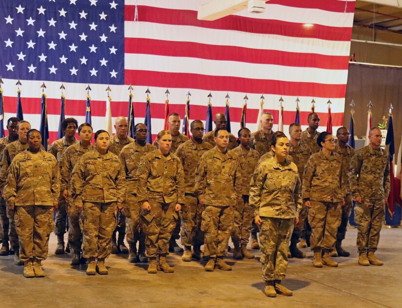 Soldiers of 8th Medical Brigade stand in formation during a transfer of authority ceremony between 8th Med and 3rd Medical Command Deployment Support - Forward at Camp As Sayliyah, Qatar, July 18, 2019.