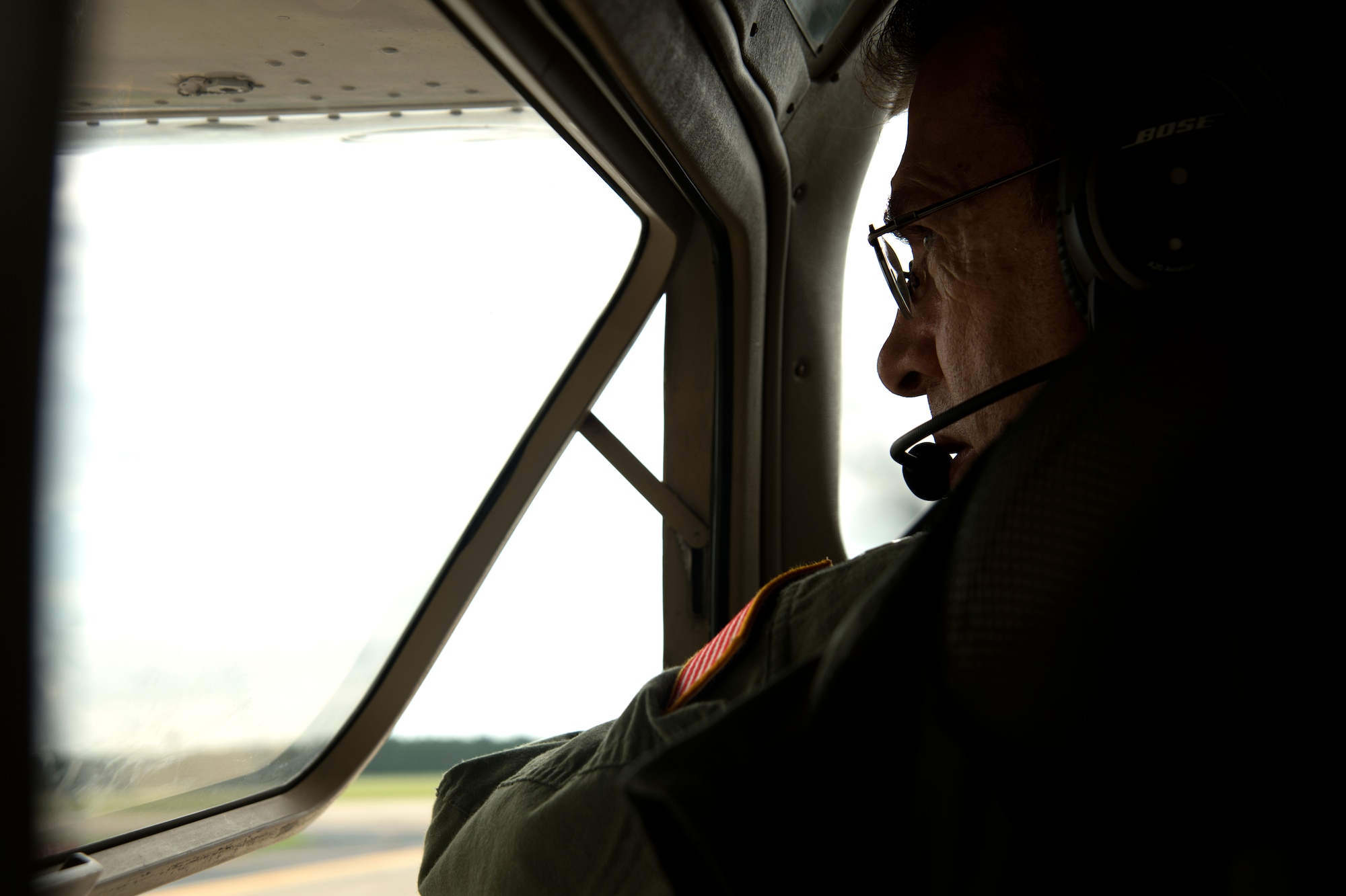 Civil Air Patrol Lt. Col. Brett Grooms, pilot, watches aircraft traffic on the flightline while taxiing his aircraft at Shaw Air Force Base, South Carolina, July 12, 2019.