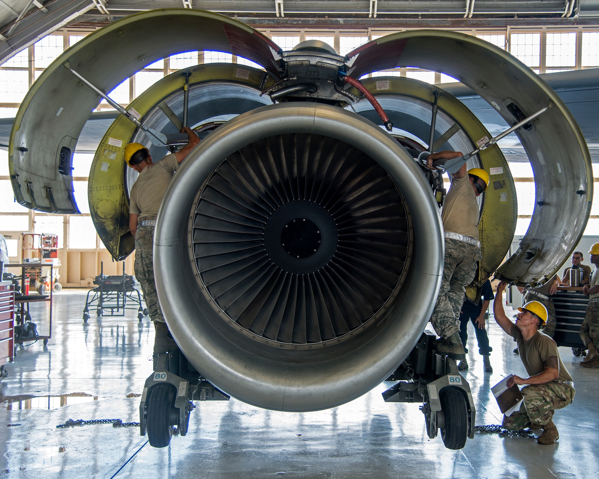 Airmen from the 6th Maintenance Squadron remove the engine from a KC-135 Stratotanker, July 1, 2019, MacDill Air Force Base, Fla.