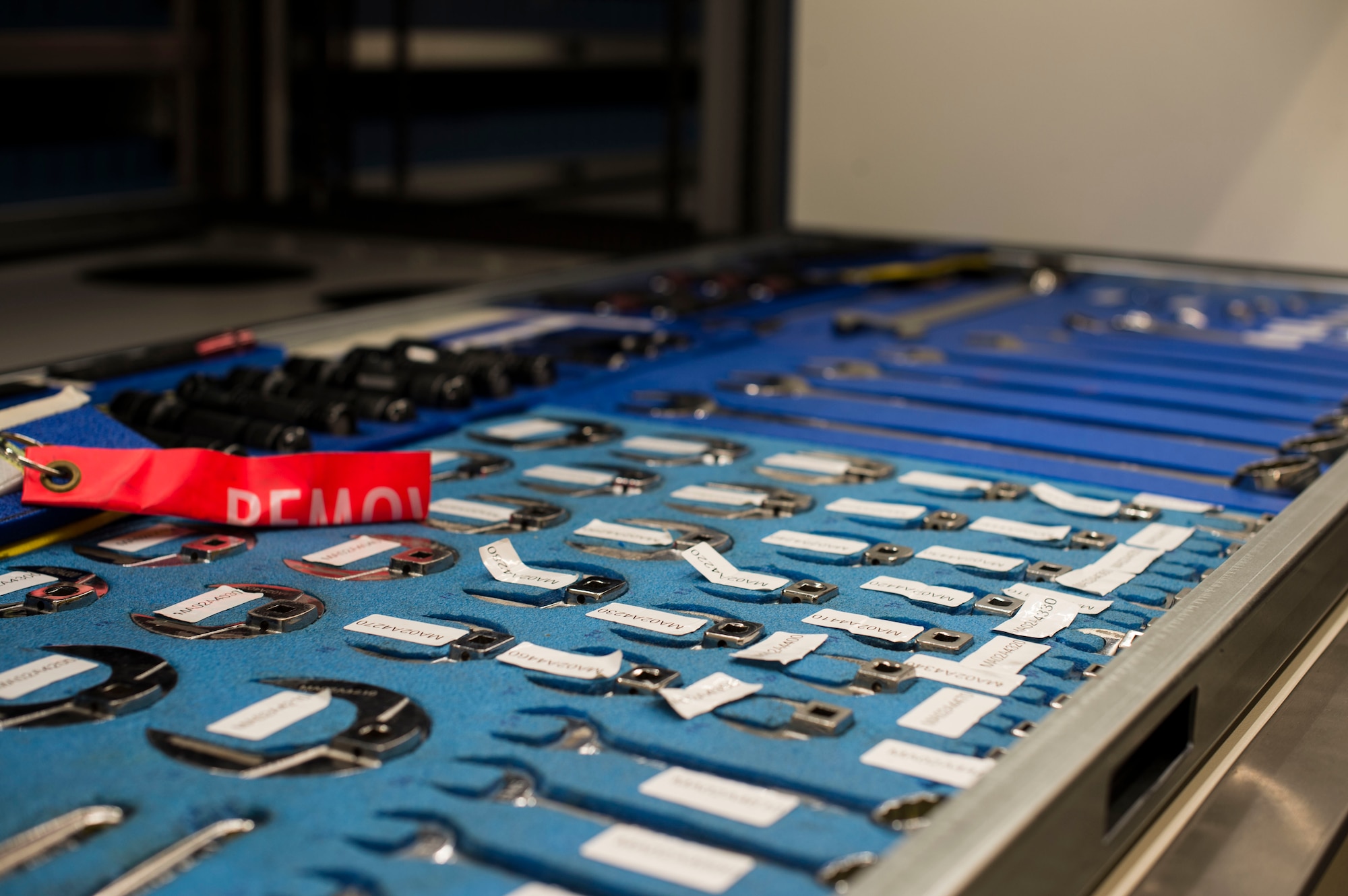 Aircraft maintenance tools lay on a tray inside a new vertical lift tool storage system at MacDill Air Force Base, Fla., July 17, 2019.