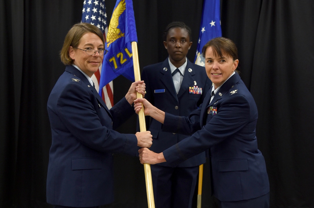 The 72nd Medical Group held a ceremony in Heritage Hall July 9 to inactivate the 72nd Dental Squadron and also to redesignate the 72nd Aerospace Medicine Squadron and the 72nd Medical Operations Squadron to the 72nd Operational Medical Readiness Squadron and the 72nd Healthcare Operations Squadron. 72nd Medical Group Commander Col. Jennifer Trinkle presided over the historical ceremony. (U.S. Air Force photo/Kelly White)