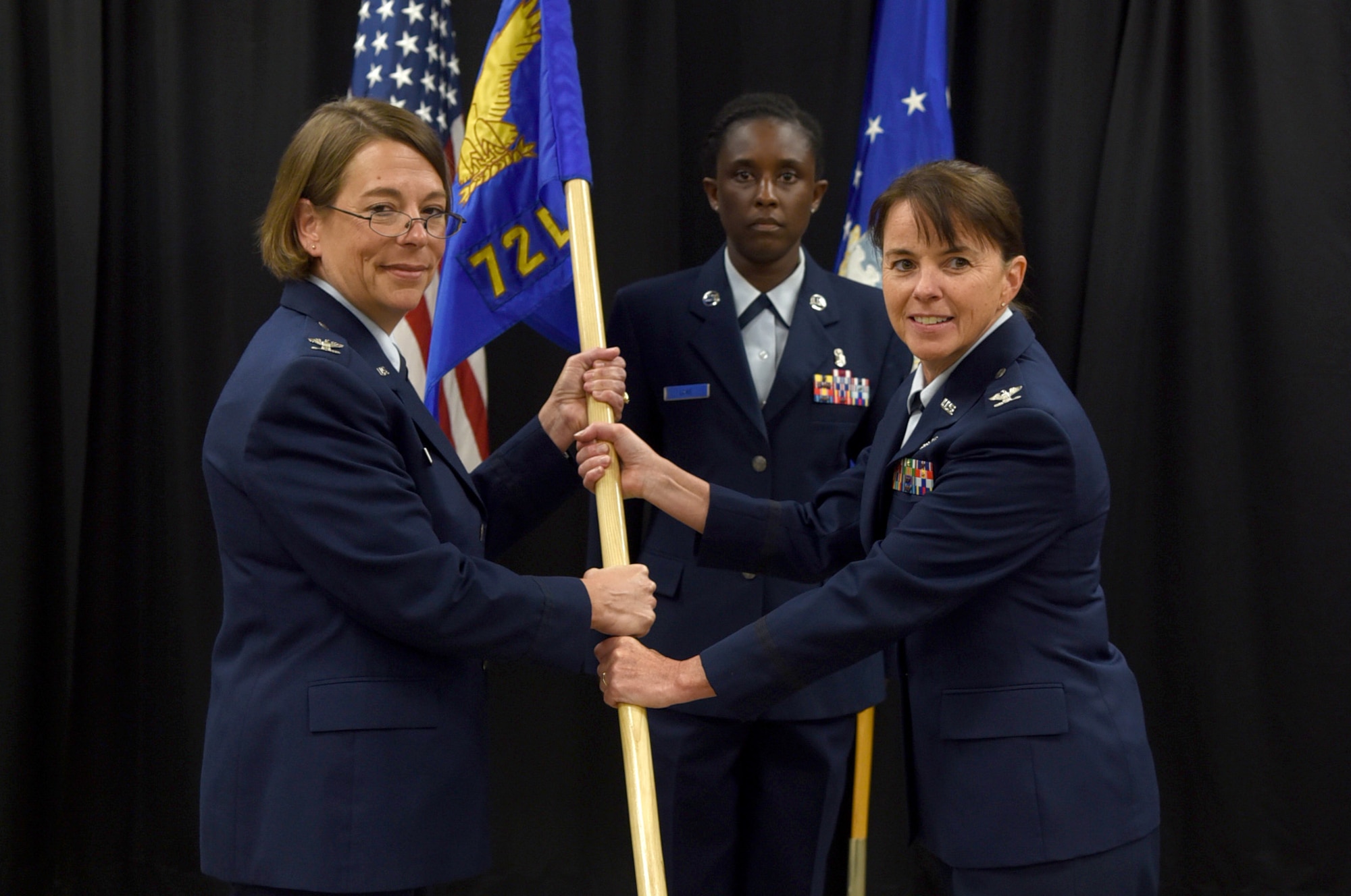 The 72nd Medical Group held a ceremony in Heritage Hall July 9 to inactivate the 72nd Dental Squadron and also to redesignate the 72nd Aerospace Medicine Squadron and the 72nd Medical Operations Squadron to the 72nd Operational Medical Readiness Squadron and the 72nd Healthcare Operations Squadron. 72nd Medical Group Commander Col. Jennifer Trinkle presided over the historical ceremony. (U.S. Air Force photo/Kelly White)