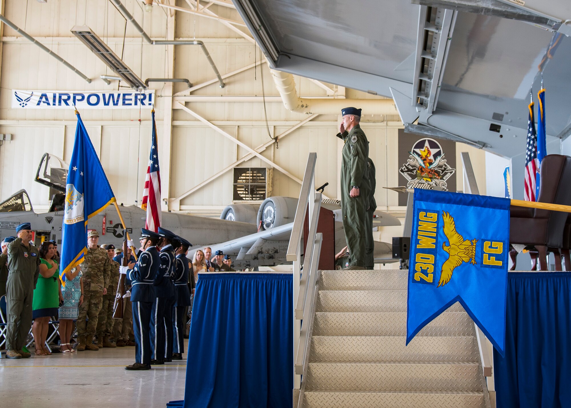 Airmen render salutes during a change of command ceremony, July 19, 2019, at Moody Air Force Base, Ga. The 23d Fighter Group is the Air Force’s largest A-10C Thunderbolt II fighter group that consists of two combat ready A-10C squadrons and an operation support squadron.   The ceremony is a military tradition that represents a formal transfer of unit’s authority and responsibility from one commander to another. (U.S. Air Force photo by Airman 1st Class Eugene Oliver)