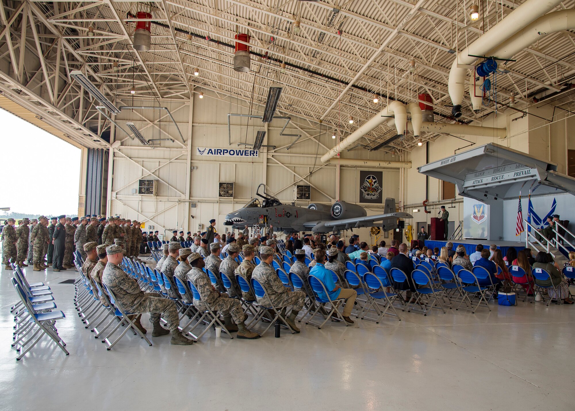 Col. Michael Curley, 23d Fighter Group commander, speaks during a change of command ceremony, July 19, 2019, at Moody Air Force Base, Ga. The ceremony is a military tradition that represents a formal transfer of unit’s authority and responsibility from one commander to another. The 23d FG is the Air Force’s largest A-10C Thunderbolt II fighter group that consists of two combat ready A-10C squadrons and an operation support squadron.  Curley will be retiring today after more than 24 years of service to the nation and the Air Force. (U.S. Air Force photo by Airman 1st Class Eugene Oliver)