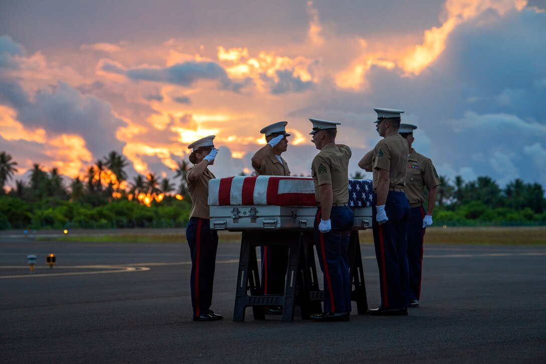 U.S. Marines from Marine Corps Forces, Pacific, salute a transfer case during a repatriation ceremony for the possible remains of unidentified service members lost in the Battle of Tarawa during WWII, Republic of Kiribati, July 18, 2019. The remains were recently recovered from sites in the Tarawa Atoll by History Flight, Inc., a DPAA partner organization, and will be accessioned into DPAA's laboratory facility in Hawaii to begin the identification process in support of DPAA's mission to provide the fullest possible accounting for our missing personnel to their families and the nation.