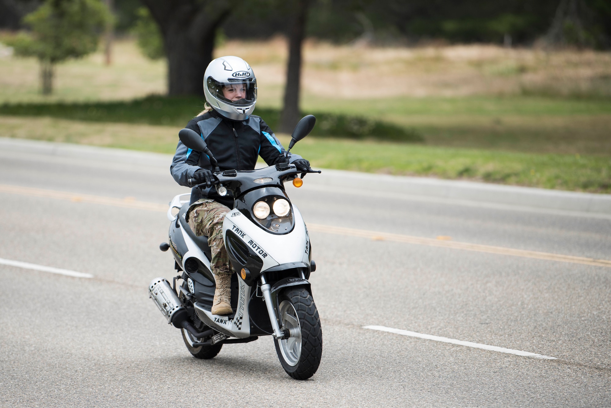 Staff Sgt. Erika Darcy, 614th Air Operations Center intel analyst and motorcycle safety representative, rides down California Avenue May 29, 2019, at Vandenberg Air Force Base, Calif. Before riding at Vandenberg, Airmen are required to go through a basic rider’s course offered by the motorcycle safety program’s local training agency partners, which provide Airmen with the necessary lifesaving skills for riding on the open road. (U.S. Air Force photo by Airman 1st Class Hanah Abercrombie)