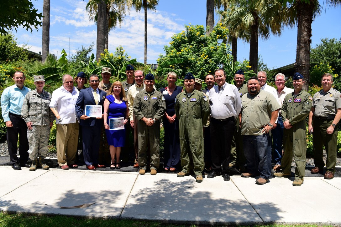 Some distinguished civic leaders stand for a group photo with some of Laughlin’s leadership and after the inaugural honorary commander’s induction ceremony, Wednesday, July 10, 2019, in Del Rio.