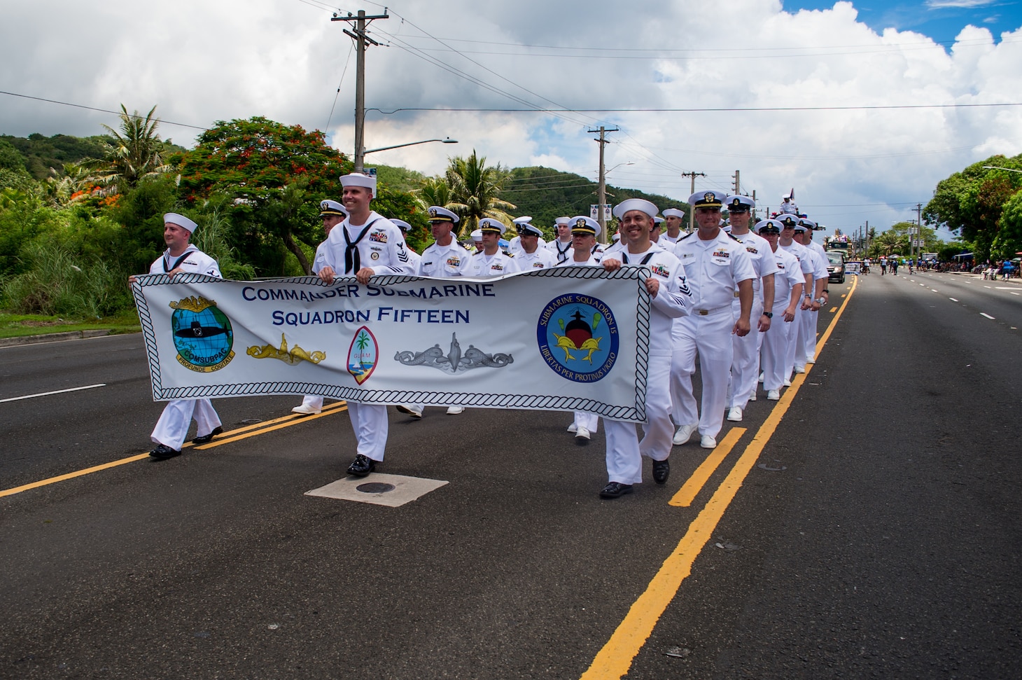 AGANA, Guam (July 21, 2019) Sailors assigned to Commander, Submarine Squadron Fifteen march in formation during the annual Liberation Day parade. The celebration commemorates the 75th anniversary of the liberation of Guam from Japanese occupation by U.S. forces during World War II.