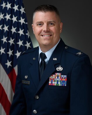 Colonel Reginald Christensen Bio