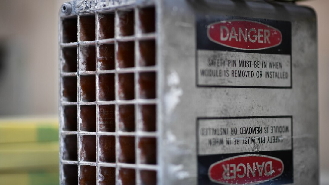 A flare housing module awaits inspection before flares are installed into the unit at Ali Al Salem Air Base, Kuwait, July 18, 2019. Flare housing modules can accommodate up to 30 flare or chaff units. Individual packages can include flare, chaff or a mixture of both units depending on operational requirements. (U.S. Air Force photo by Staff. Sgt. Mozer O. Da Cunha)