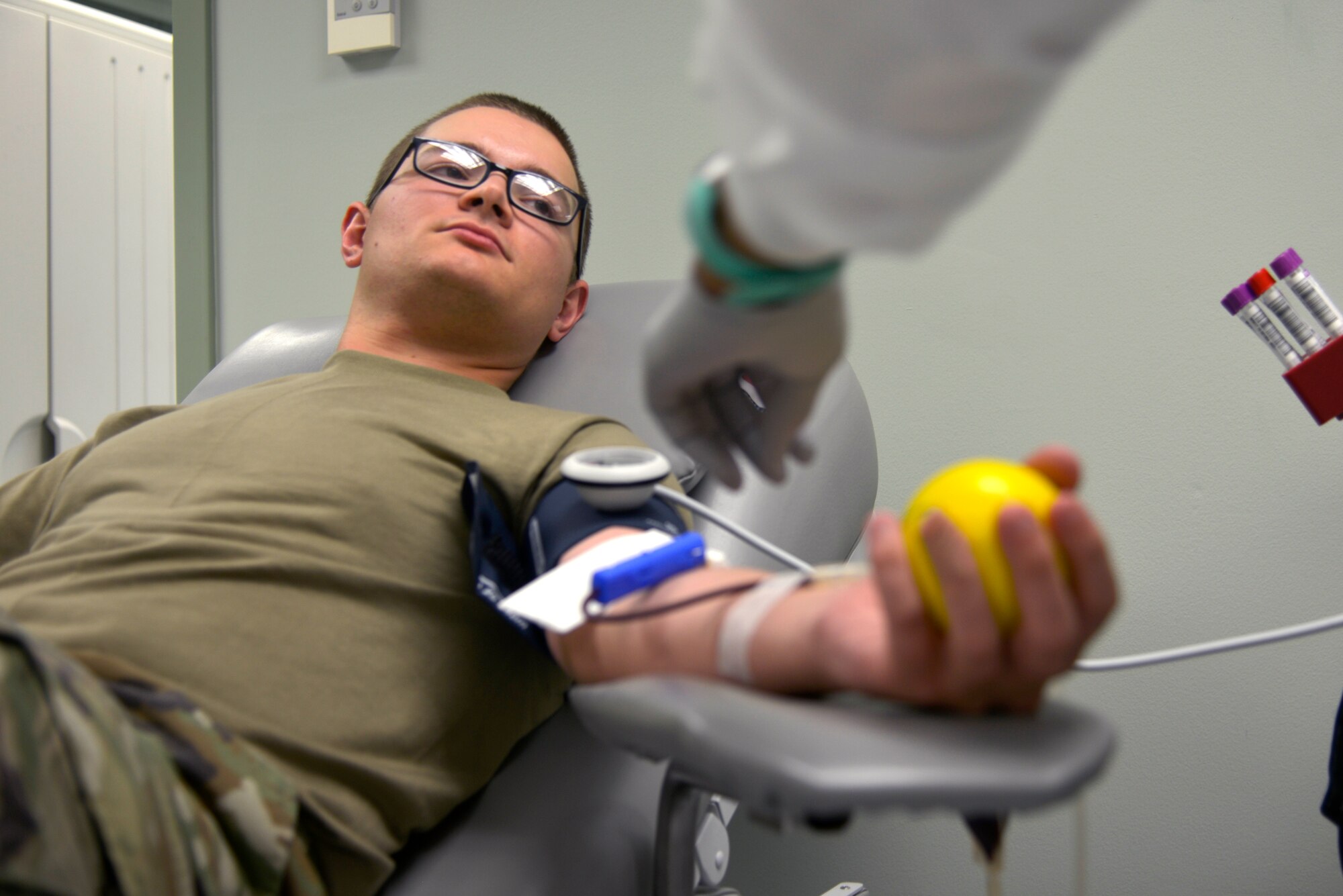 Rhonda McNair, 81st Diagnostics and Therapeutics Squadron phlebotomist, draws blood from U.S. Air Force Airman Jace York, 336th Training Squadron student, at the Blood Donor Center at Keesler Air Force Base, Mississippi, July 16, 2019. The Keesler Blood Donor Center provides blood to deployed service members.  (U.S. Air Force photo by Airman Seth Haddix)