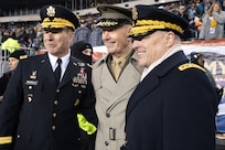 Vice Chief of Staff of the Army Gen. James C. McConville, Chairman of the Joint Chiefs of Staff Marine Corps Gen. Joe Dunford, and Army Chief of Staff Mark A. Milley pose for a photo during the 2018 Army Navy Game in Philadelphia, Pennsylvania, Dec. 8, 2018. The U.S. Military Academy cadets from West Point won 17-10.
