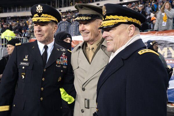 Vice Chief of Staff of the Army Gen. James C. McConville, Chairman of the Joint Chiefs of Staff Marine Corps Gen. Joe Dunford, and Army Chief of Staff Mark A. Milley pose for a photo during the 2018 Army Navy Game in Philadelphia, Pennsylvania, Dec. 8, 2018. The U.S. Military Academy cadets from West Point won 17-10.