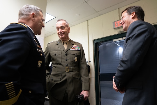 Marine Corps Gen. Joseph F. Dunford, Jr., chairman of the Joint Chiefs of Staff, speaks with Army Gen. Mark A. Miley, Chief of Staff of the Army, and Dr. Mark T Esper, Secretary of the Army, before the 2018 Army Navy Game in Philadelphia, Pa., Dec. 8, 2018.  The U.S. Military Academy cadets from West Point broke a 14-year Navy win streak after defeating the U.S. Naval Academy Midshipmen 21-17.
