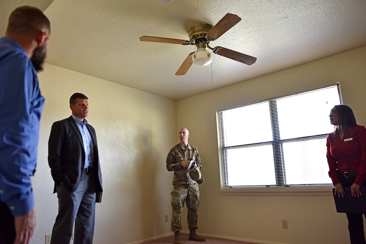 The Honorable John W. Henderson, Assistant Secretary of the Air Force for Installations, Environment and Energy, receives a tour of on base of permanent party housing during his visit to Goodfellow Air Force Base, Texas, July 11, 2019. One subject discussed during the visit was the infrastructure and housing for permanent party and students. (U.S. Air Force photo by Senior Airman Seraiah Wolf/Released)