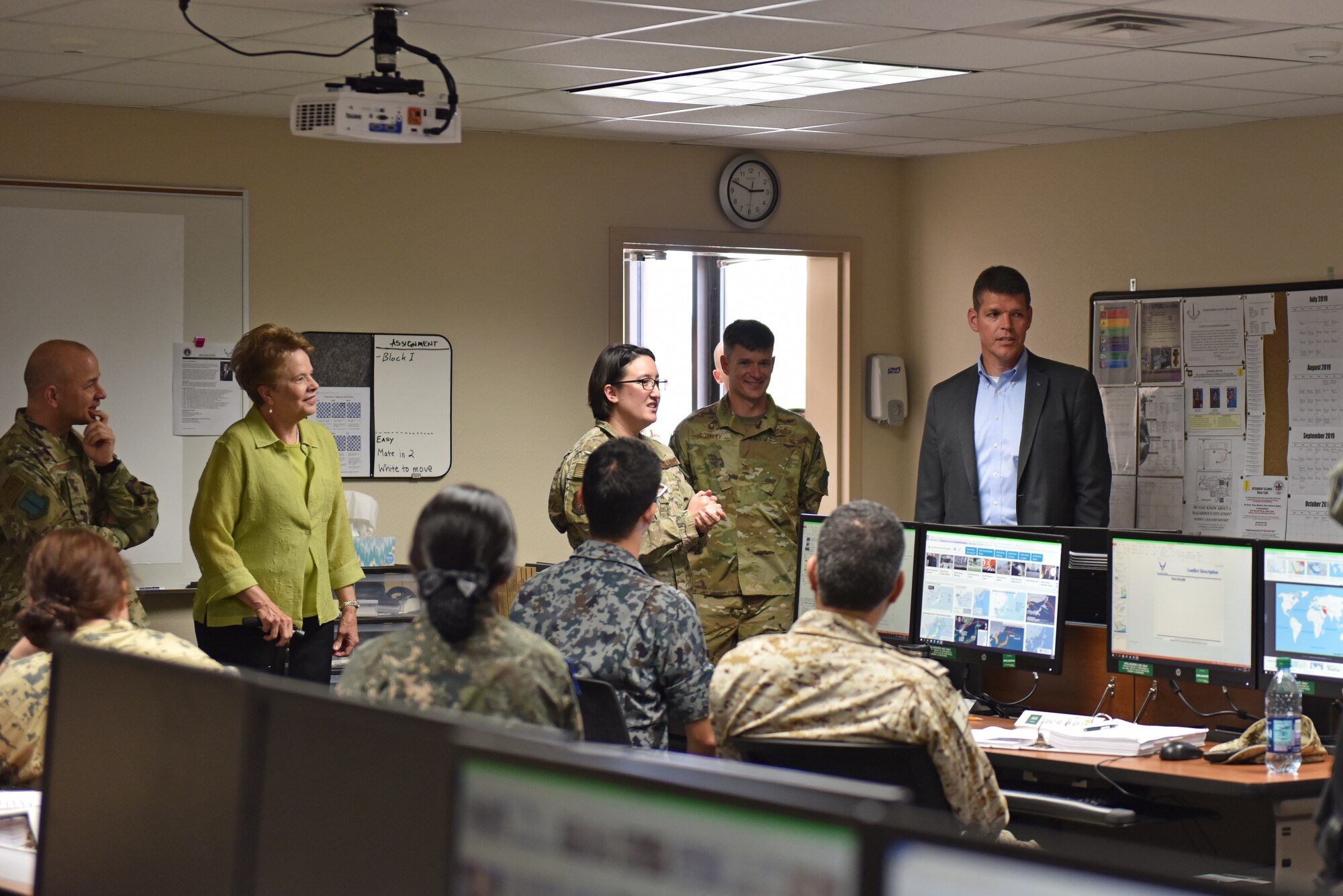 The Honorable John W. Henderson, Assistant Secretary of the Air Force for Installations, Environment and Energy, talks with international students during his visit to Goodfellow Air Force Base, Texas, July 11, 2019. Through a partnership with the Department of Defense, and the State Department Goodfellow students train with members of allied nations. (U.S. Air Force photo by Senior Airman Seraiah Wolf/Released)