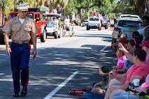 Col. Timothy Miller walks during the 64th annual Beaufort Water Festival Grand Parade in downtown Beaufort, July 20. Miller is the commanding officer of Marine Corps Air Station Beaufort.