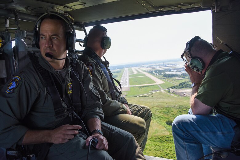 Photo from helicopter of BASH Team observing local area.