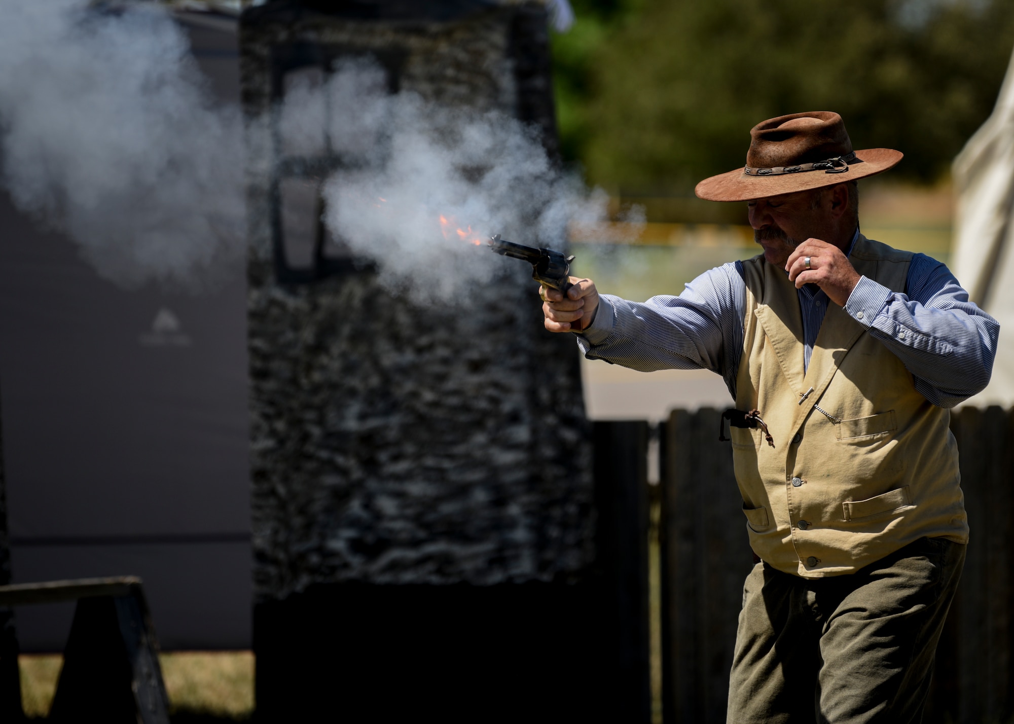 A Wyoming Widow Maker gunslinger performs at Fort D.A. Russell Days, July 19, 2019, at F.E. Warren Air Force Base, Wyo. The Wyoming Widow Makers come from Laramie, Wyo., and demonstrate gun safety, as well as, an old western shootouts. (U.S. Air Force photo by Staff Sgt. Ashley N. Sokolov)