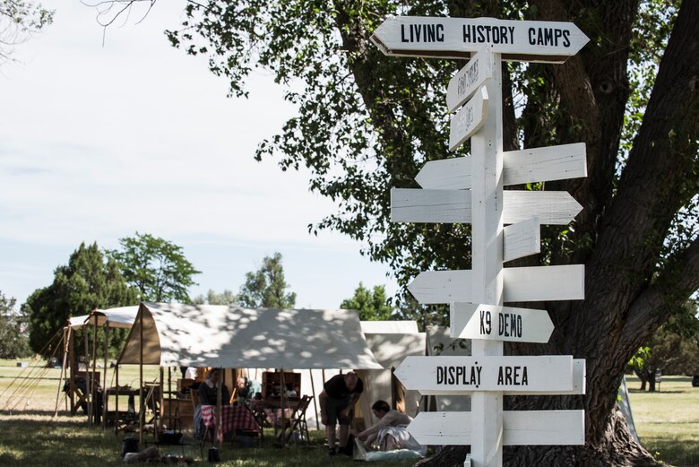 Direction signs welcome visitors at the enterance of Fort D.A. Russell Days July 19, 2019, on F.E. Warren Air Force Base, Wyo. The annual open house invites the community and visitors to tour the base to learn about its history and its current ICBM deterrence mission. (U.S. Air Force photo by Senior Airman Abbigayle Williams)