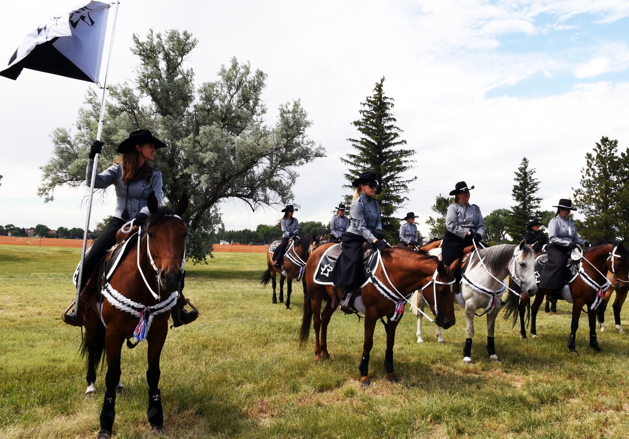 Members of the Trotters team showcase their skills during Fort D.A. Russell Days, the annual open house on F.E. Warren Air Force Base, Wyo., July 20, 2019. The Trotters perform each year during Fort D.A. Russell Days. The open house gives the community a peek into the history of the base and its role within the nation’s defense. (U.S. Air Force photo by Senior Airman Breanna Carter)