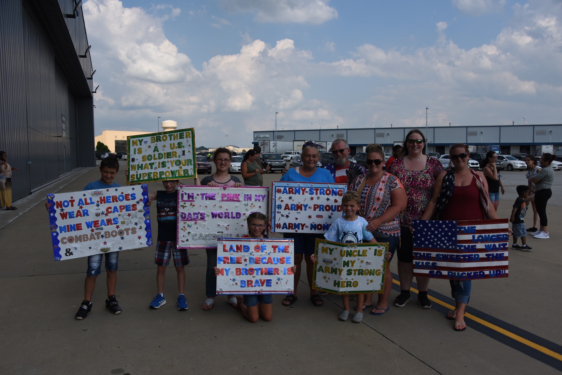 Pennsylvania National Guardsmen with the 28th Military Police Company are greeted by loved ones near Pittsburgh July 10, 2019 after a deployment to the middle east.