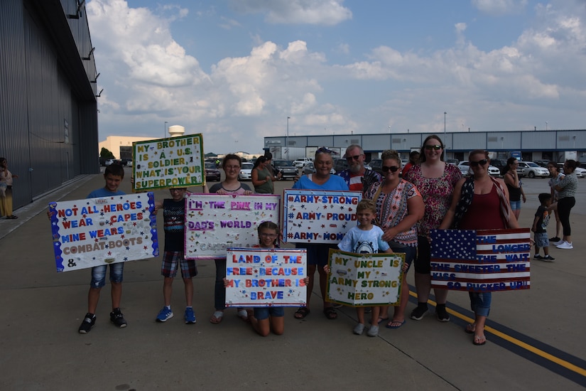Pennsylvania National Guardsmen with the 28th Military Police Company are greeted by loved ones near Pittsburgh July 10, 2019 after a deployment to the middle east.