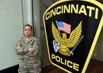 Ohio Air National Guard Tech. Sgt. Chelsea Lovelace, an analyst for the Ohio National Guard’s Counterdrug Task Force, stands for a photo at the Cincinnati Police Department’s Narcotics Division. Lovelace lost her father to a morphine pill overdose and now works to get drugs off the streets of greater Cincinnati.