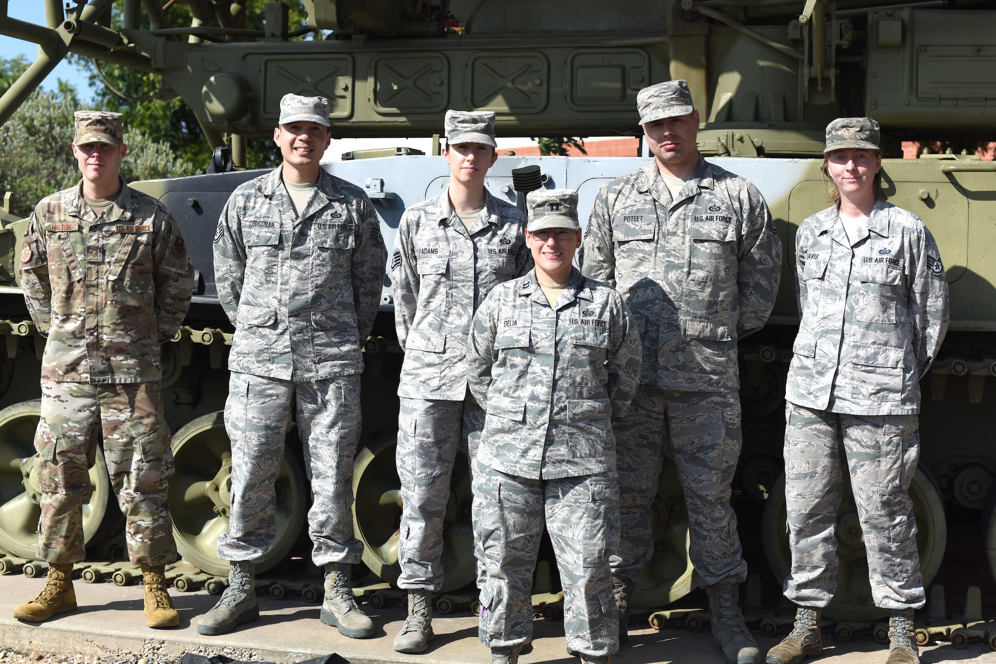 The instructors for the new 1N8 Targeting Course stand outside Di Tommaso Hall for a photo on Goodfellow Air Force Base, Texas, July 17, 2019. These instructors helped rewrite the old course to better prepare Airmen for the new career field. (U.S. Air Force photo by Senior Airman Seraiah Wolf/Released)