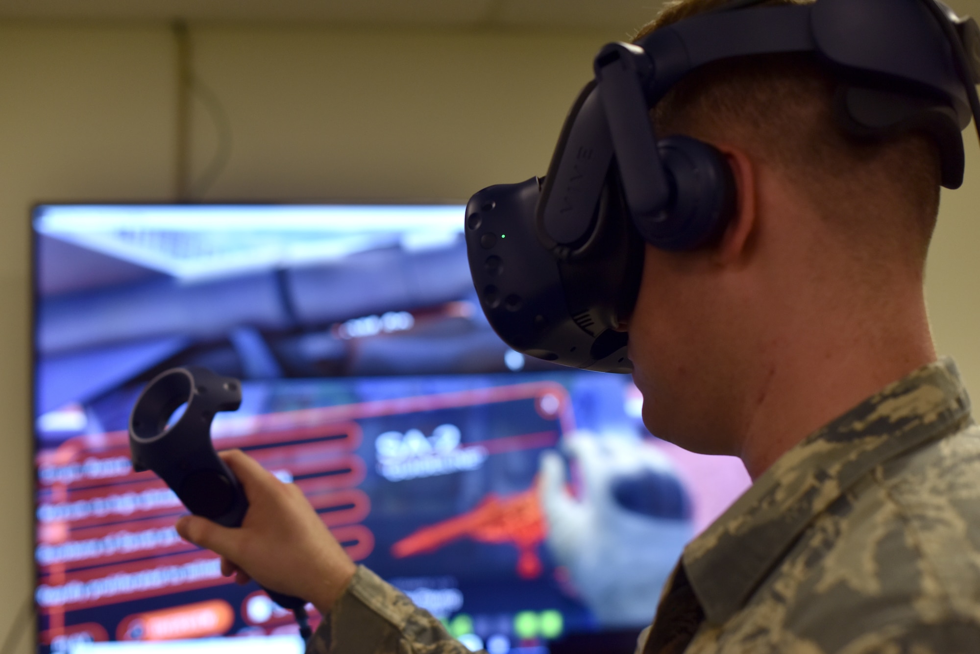 U.S. Air Force Airman 1st Class Wyatt Koppang, a 315th Training Squadron student, uses the new virtual reality software designed for the targeting career field at Brandenburg Hall on Goodfellow Air Force Base, July 11, 2019. This portion of the course allows students to view not readily accessed munitions while attending their training. (U.S. Air Force photo by Senior Airman Seraiah Wolf/Released)