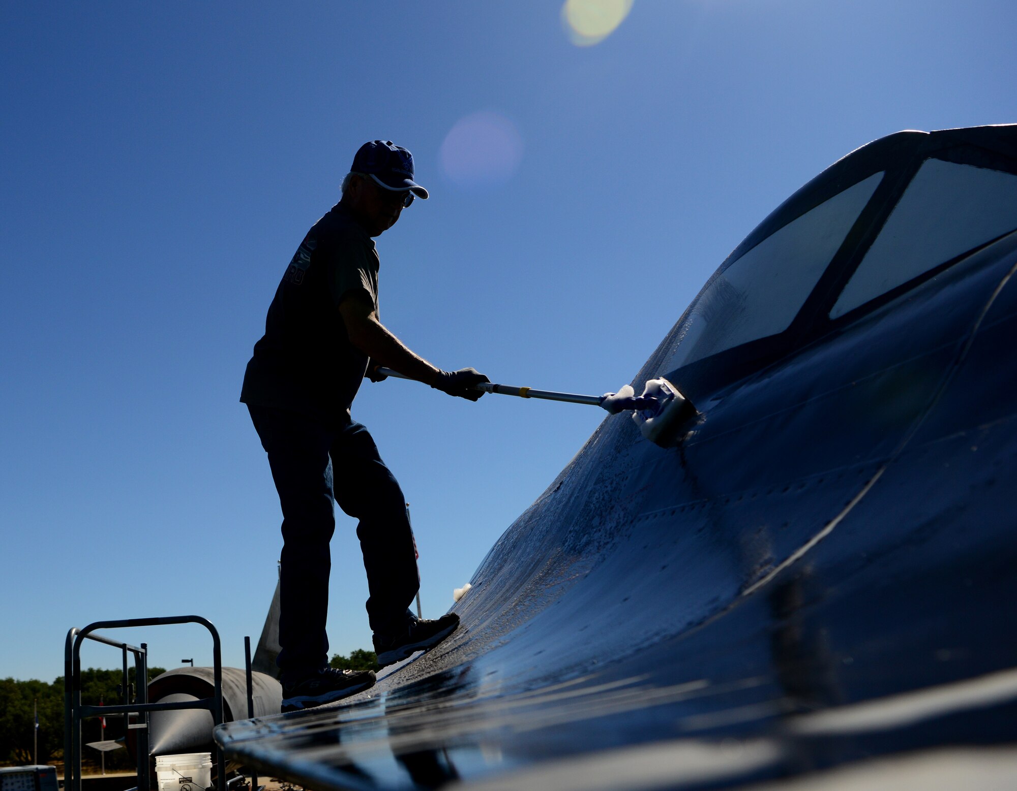 Airmen and former maintainers wash SR-71 Blackbird