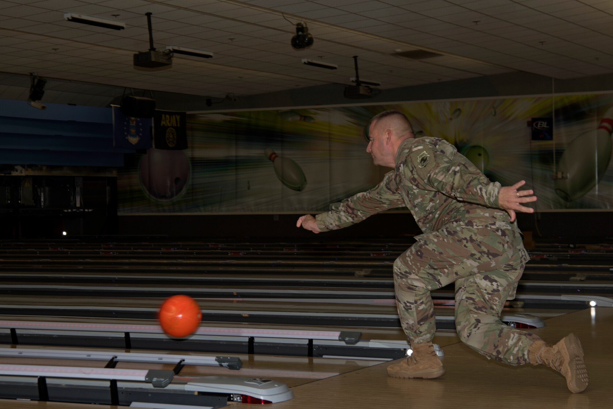 U.S. Air Force Chief Master Sgt. Jason Morehouse, 20th Fighter Wing command chief, plays a HyperBowling game at the 20th Force Support Squadron Shaw Lanes Bowling Center at Shaw Air Force Base, South Carolina, July 19, 2019.