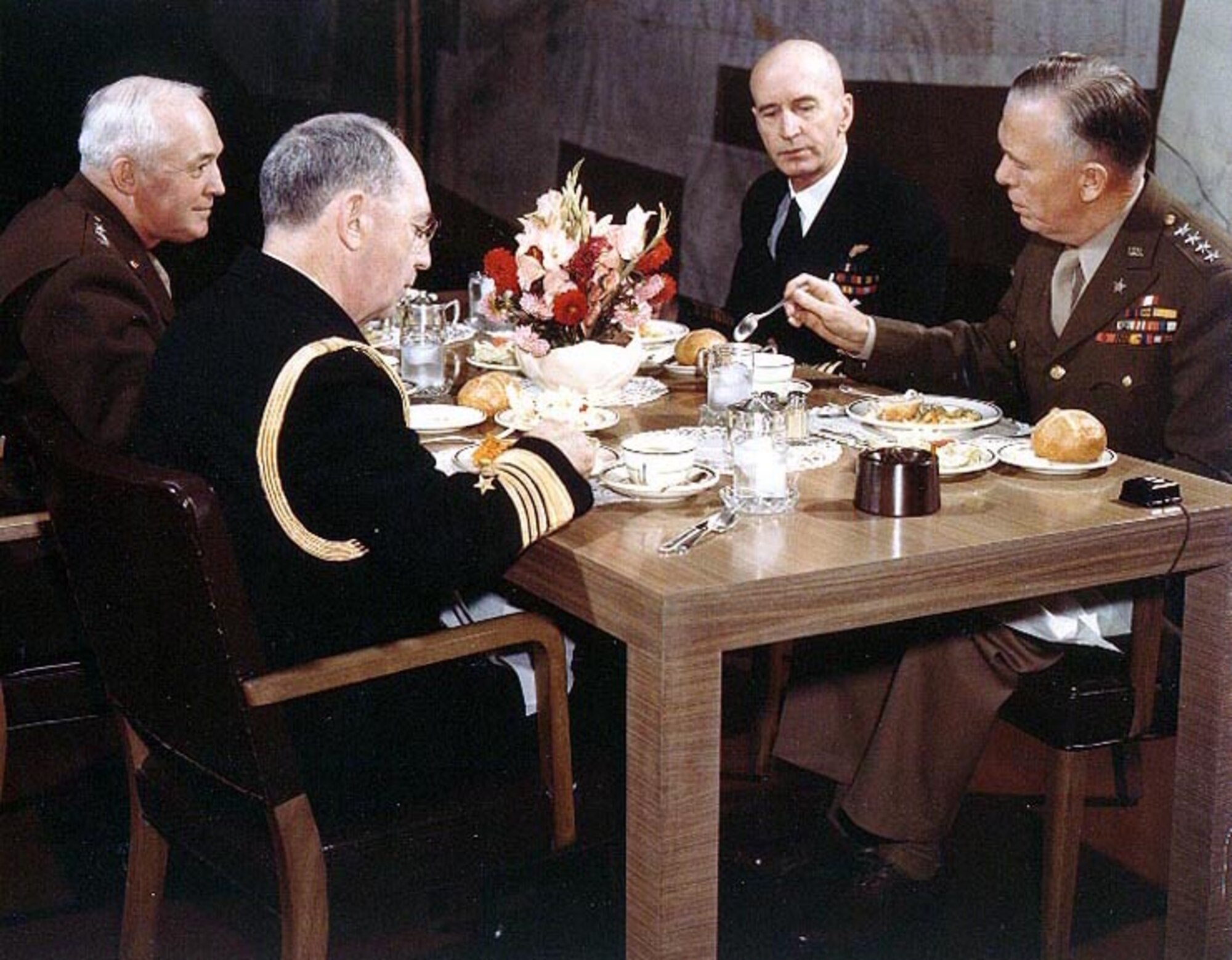Joint Chiefs of Staff at a luncheon meeting (circa 1943). Counterclockwise: Adm. William D. Leahy, chief of staff to the commander in chief of the Army and Navy; Gen. George C. Marshall, chief of staff of the U.S. Army; Adm. Ernest J. King, commander in chief, U.S. Fleet and chief of naval operations; and Gen. Henry H. Arnold, chief of the Army Air Forces.