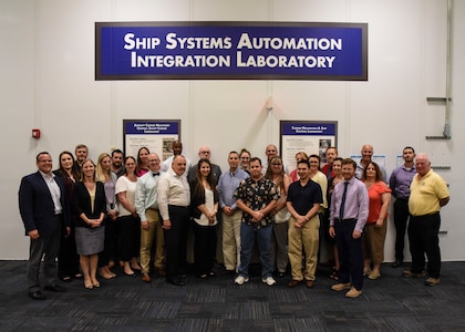 PHILADELPHIA (19 July 2019) Graduates of the most recent cohort of Propel training pose with Naval Surface Warfare Center, Philadelphia Division (NSWCPD) Technical Director, Mr. Thomas Perotti, SES (far left). Propel is a five-day course that provides practical hands-on training for new supervisors focusing on real-world workplace issues and different ways to resolve them. (U.S. Navy photo by Keegan Rammel/Released)