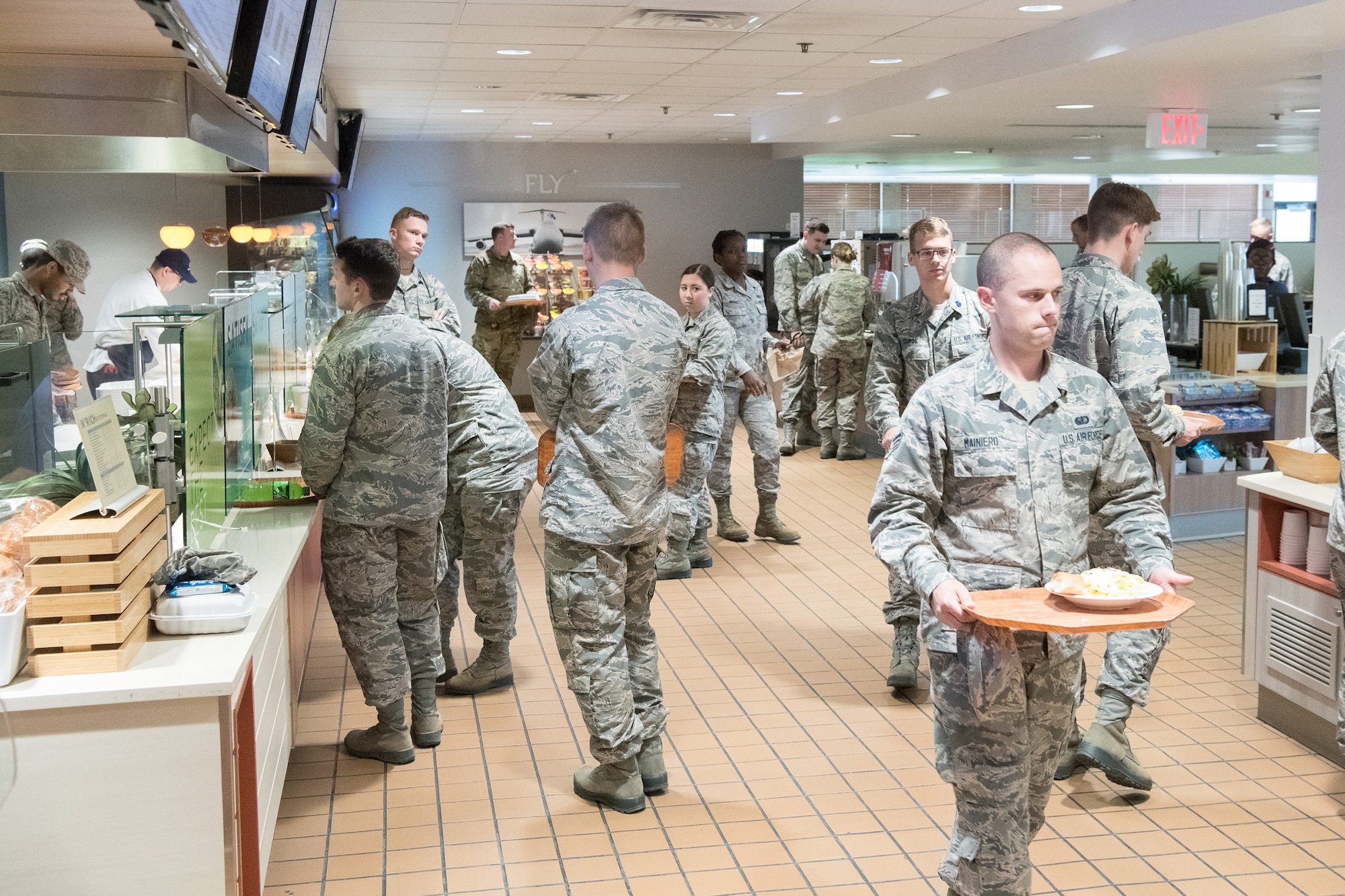 Airmen grab lunch June 11, 2019, at the Patterson Dining Facility, Dover Air Force Base, Del. The Patterson DFAC serves roughly 700-800 people daily, mostly during lunch. (U.S. Air Force photo by Mauricio Campino)