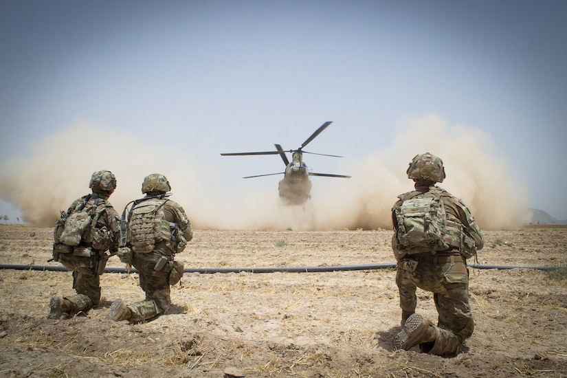 Soldiers secure a landing spot.