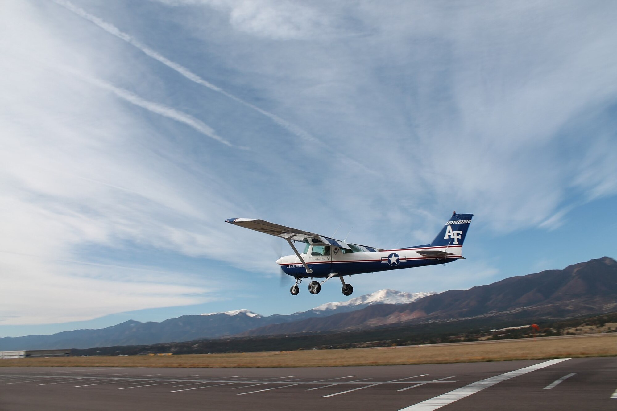 The U.S. Air Force Academy will hold a Public Release Open House to share the results of the Air Installations Compatible Use Zones study at the Pikes Peak Library District East Library, Wednesday, July 24, 2019, from 5 p.m. to 8 p.m. Pictured here, a USAFA T-51 performs a precision landing at the Academy’s airfield (Courtesy Photo).