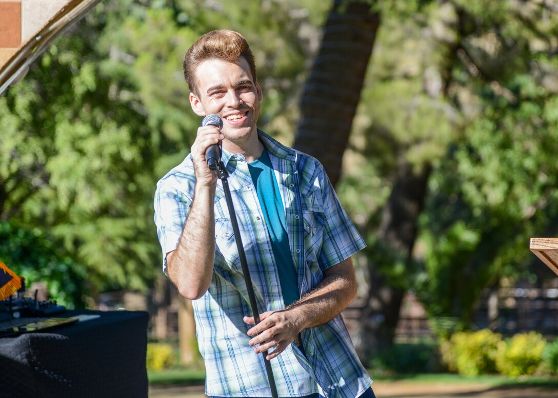 Local contemporary singer "Rat Pack" Ricky Medlin performs at the Edwards Air Force Base Civilian-Military Support Group's annual BBQ dinner at the Hacienda Lane Ranch in Palmdale, Calif., July 18. (U.S. Air Force photo by Giancarlo Casem)